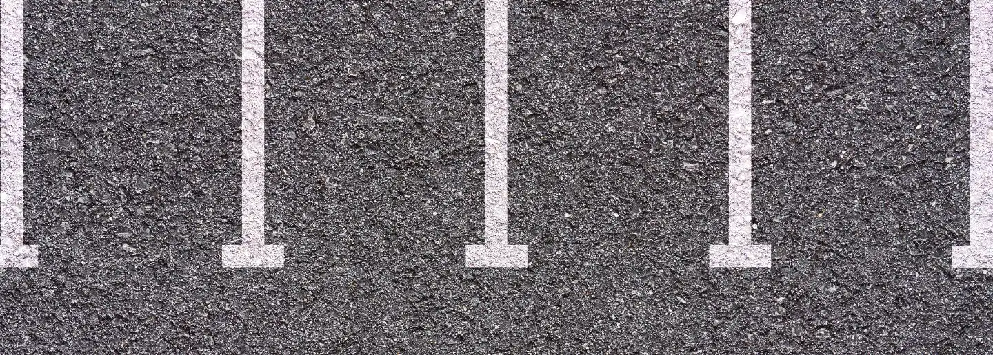 top shot of parking bays on asphalt naples fl